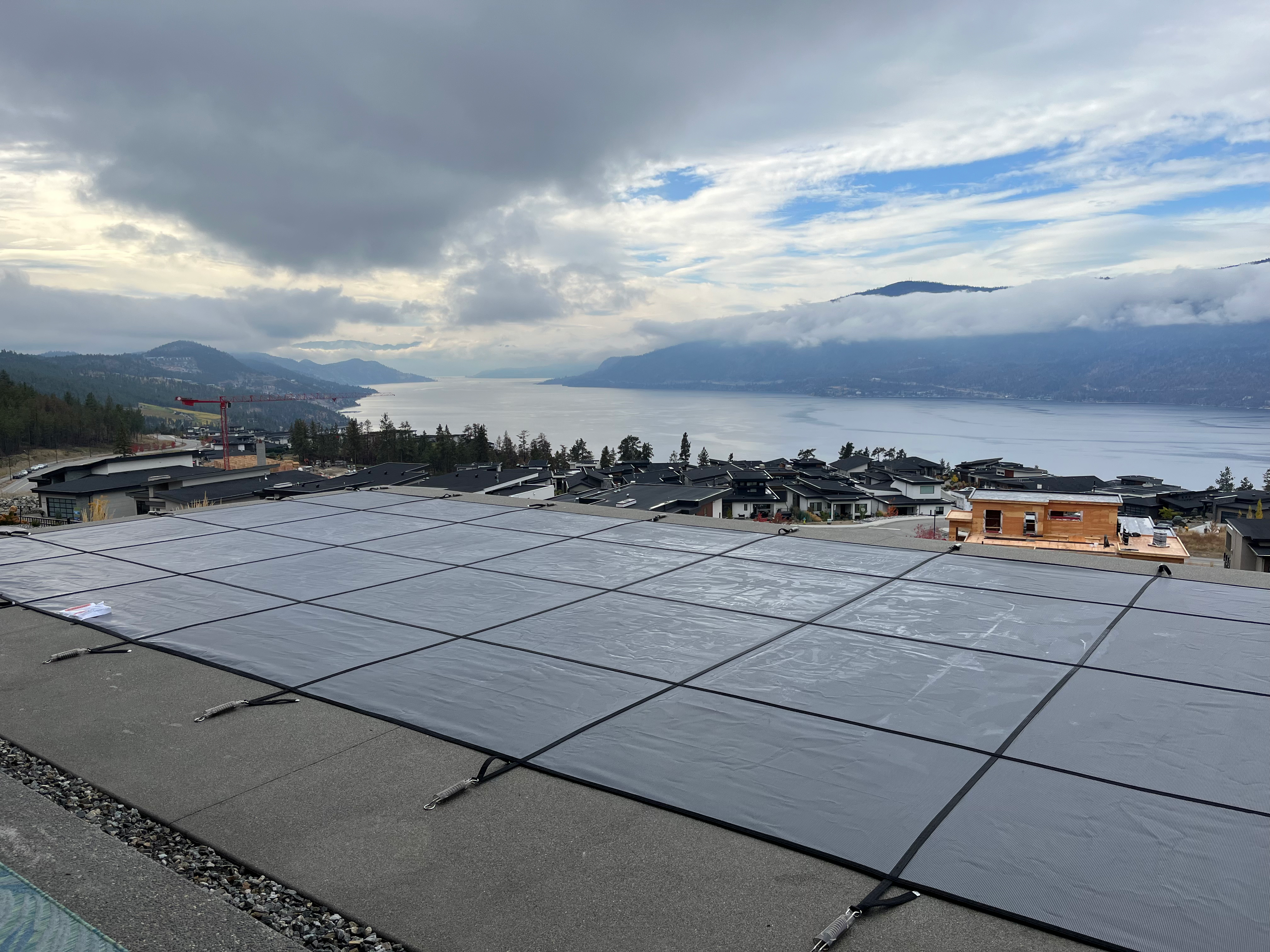 Pool cover on a lake-view property