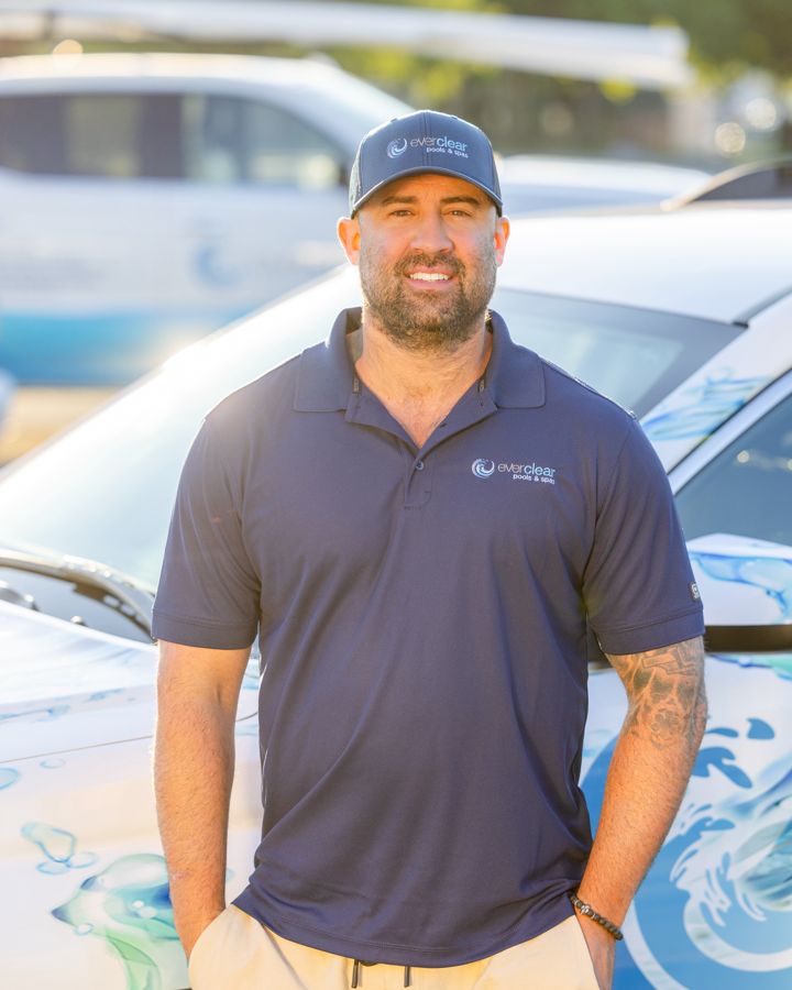 Deven Pakish standing beside an Everclear truck