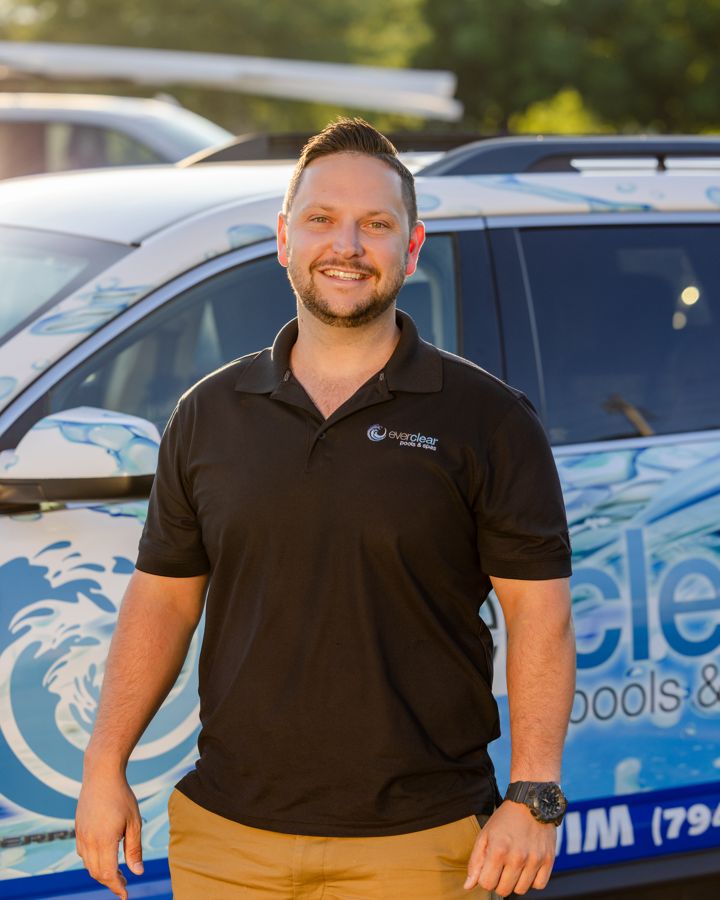 Jason Lamb standing beside an Everclear truck